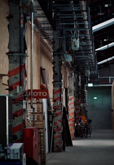 a building with a lot of red and white signs on the side of it