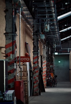 a building with a lot of red and white signs on the side of it