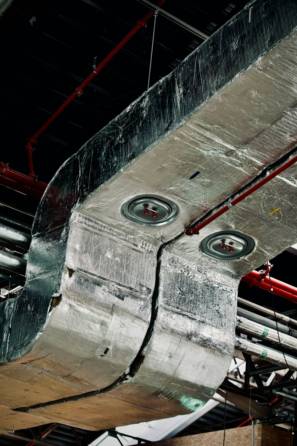 a plane is being worked on in a factory