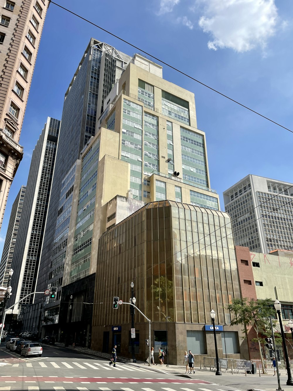 a tall building sitting next to a traffic light