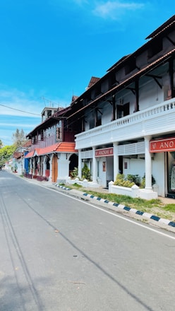 a row of buildings on the side of a street