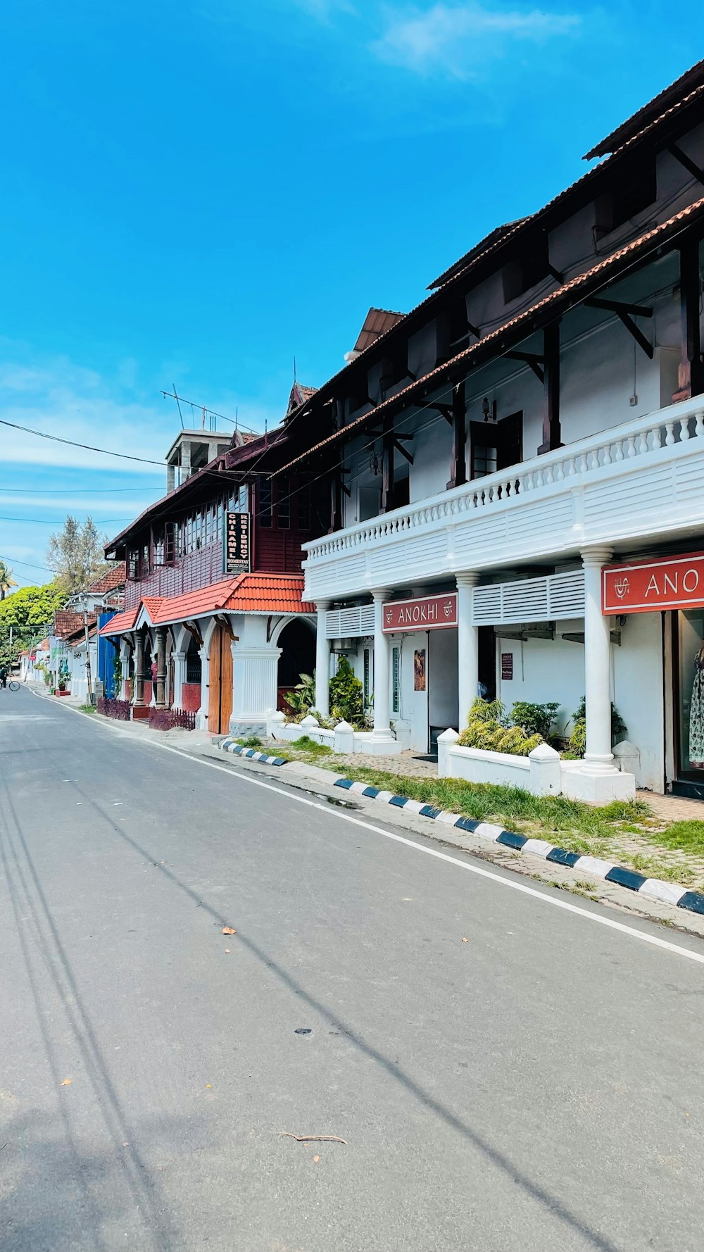 a row of buildings on the side of a street