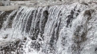 Close-up of a waterfall design with realistic water flow simulations.