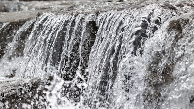 Close-up of a waterfall design with realistic water flow simulations.