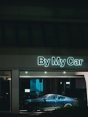 a car is parked in front of a building