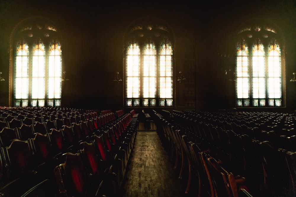 rows of chairs in front of two large windows