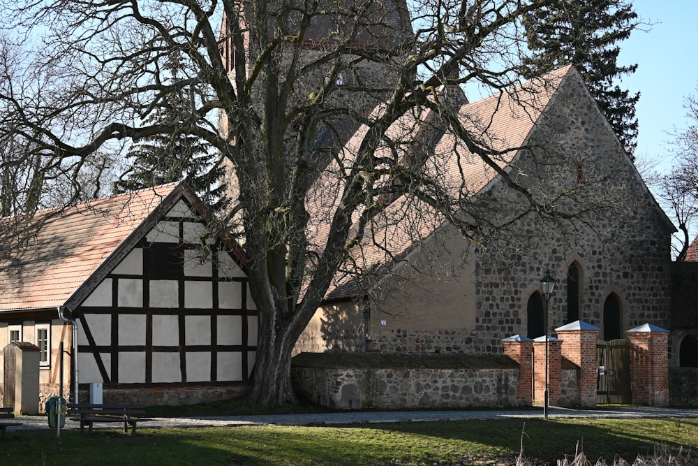 an old church with a clock tower in the background