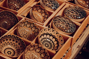 Artful arrangement of ricely’s rice packaging alongside traditional wooden scoops and bowls