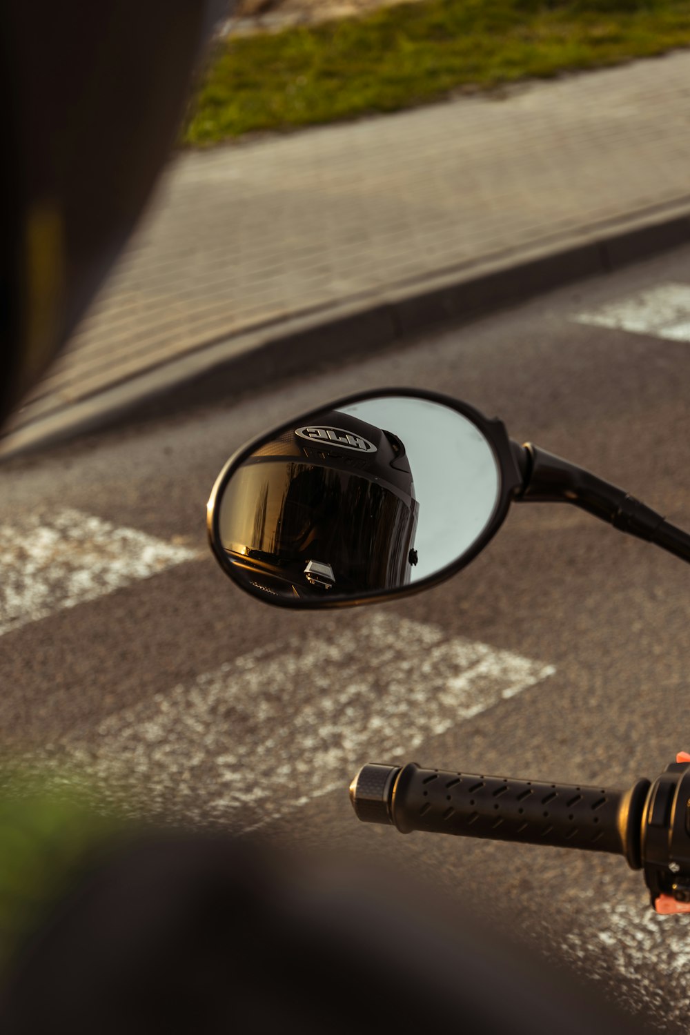 a person riding a motorcycle with a helmet on