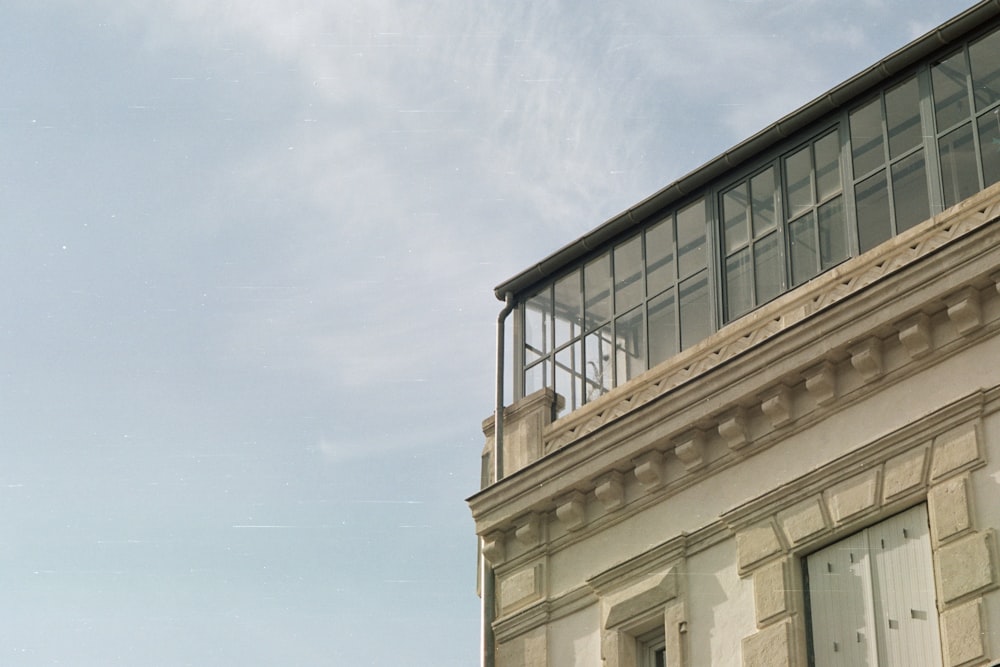 a tall building with a clock on the top of it