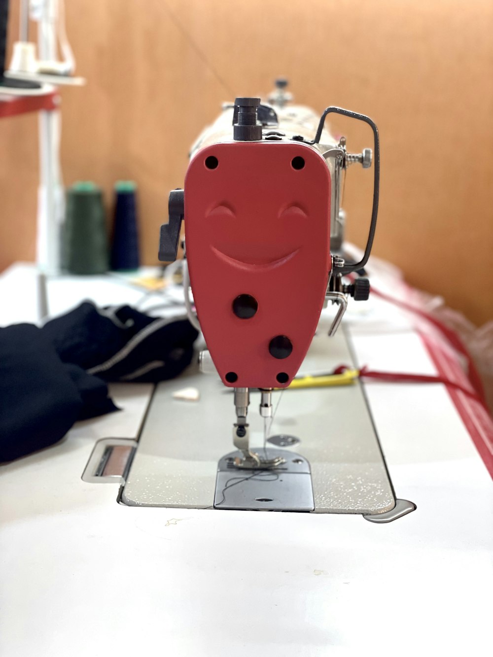 a sewing machine sitting on top of a table