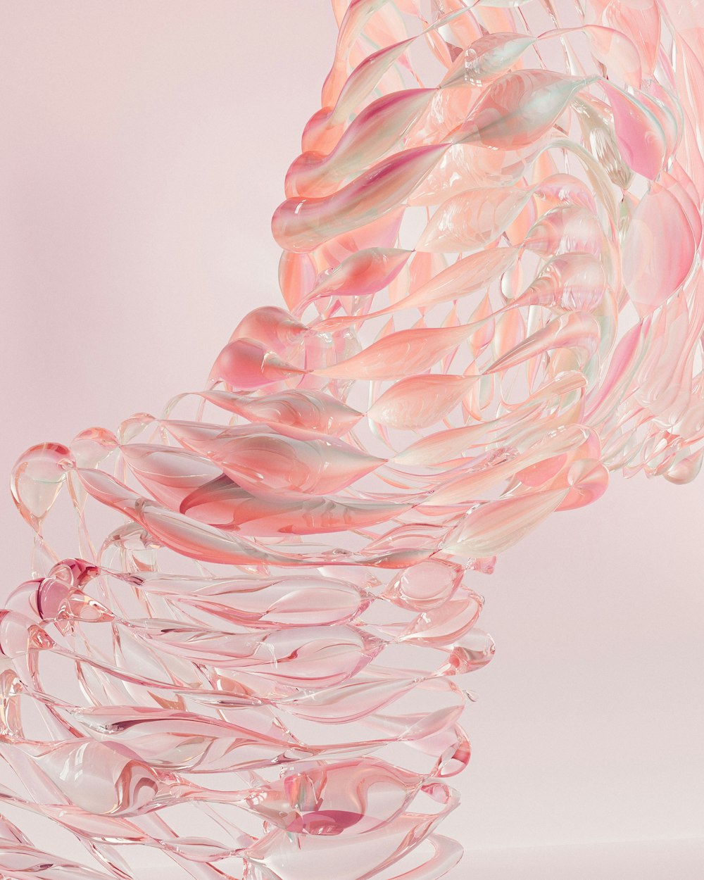 a sculpture made of pink and white glass