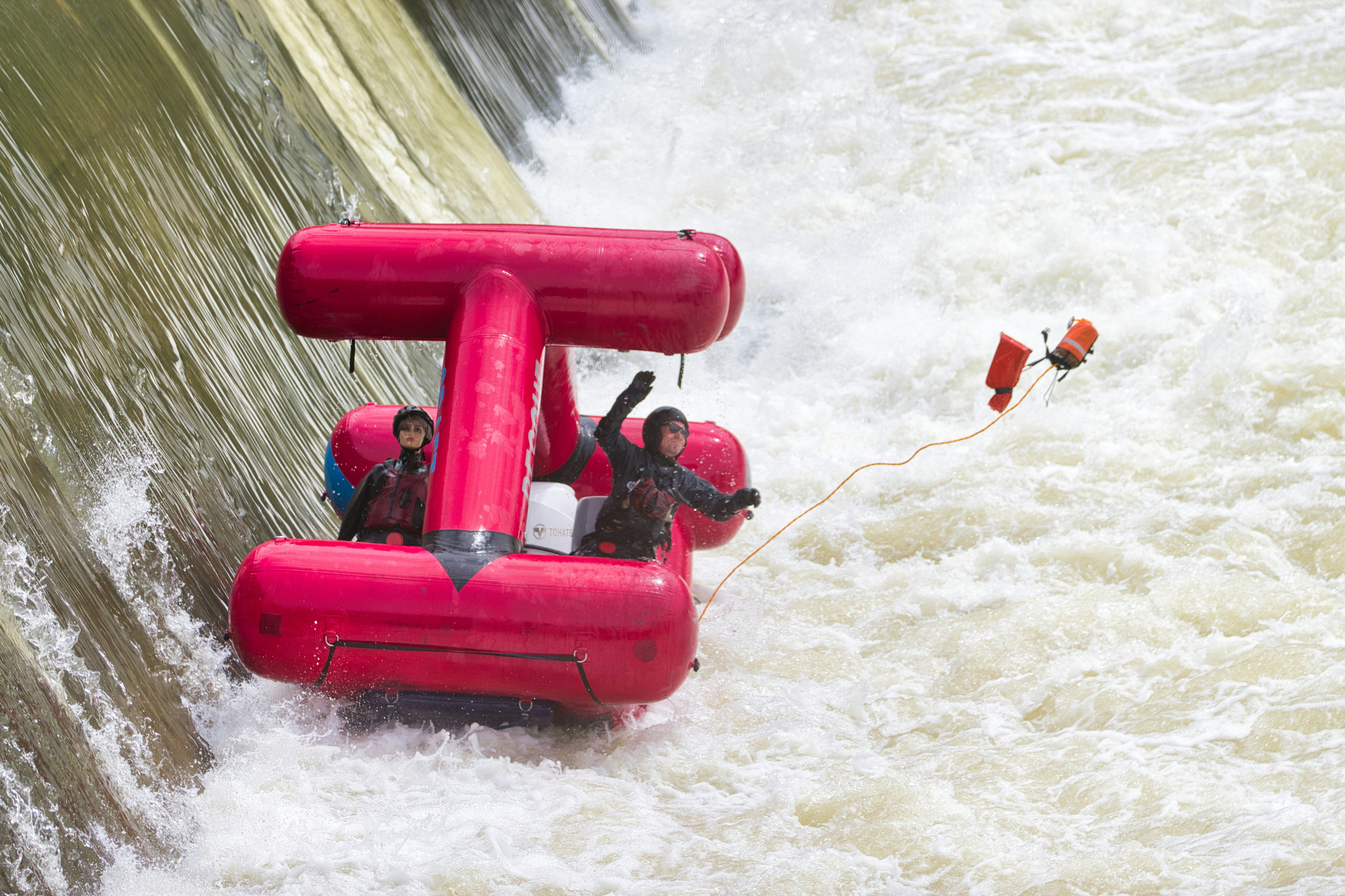 A group of people riding on top of a raft down a river photo – Free ...