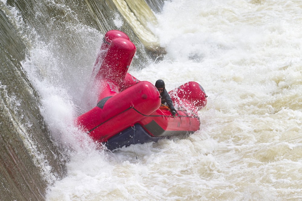 a raft is in the middle of a raging river