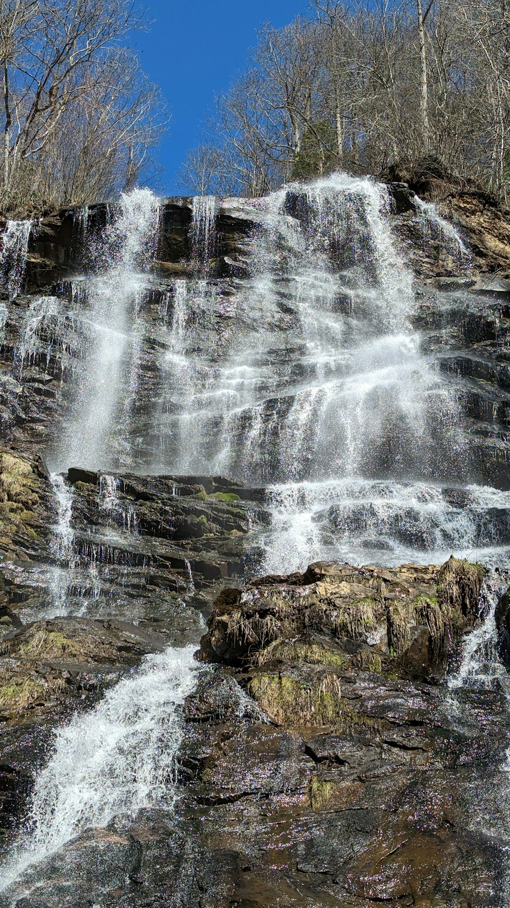 a large waterfall with lots of water coming out of it