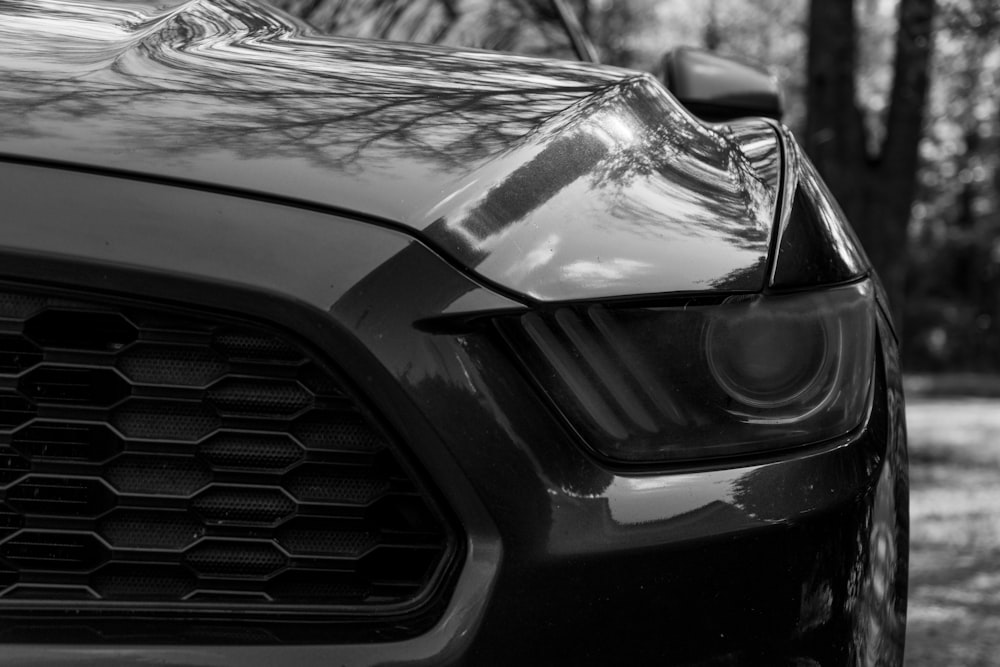 a close up of the front grille of a car