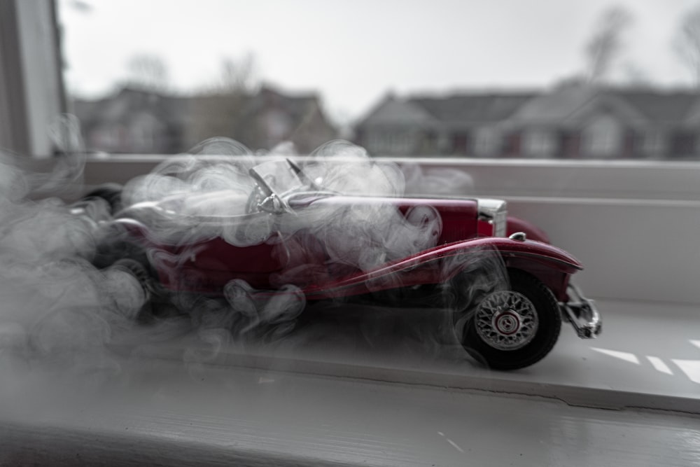 a toy car with smoke coming out of it