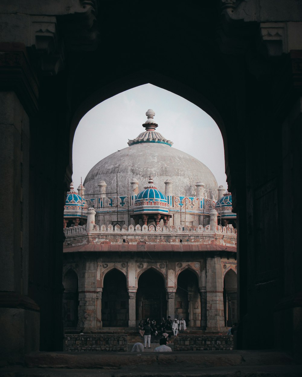 a view of a building through an archway