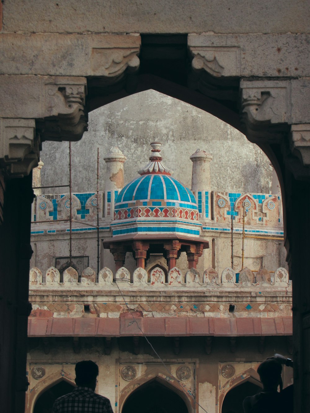 a building with a blue dome on top of it