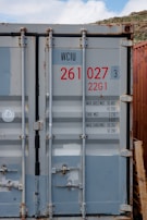 A reconditioned 40-foot container featuring double doors, slightly weathered but solid.