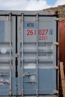 A reconditioned 40-foot container featuring double doors, slightly weathered but solid.