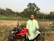 A young man happily riding a rented motorbike along a scenic route near Lạng Sơn.