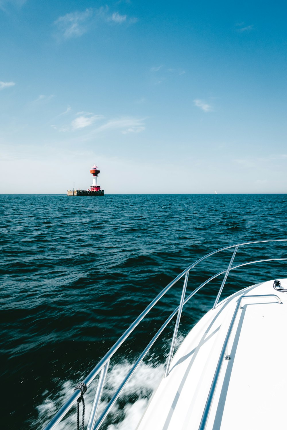 a boat traveling across a large body of water