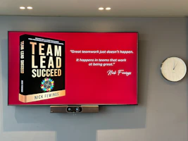 Manager delegating tasks confidently to team members
