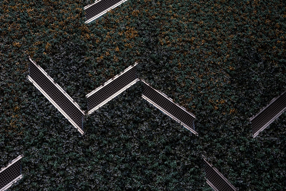 an aerial view of a street sign on the ground