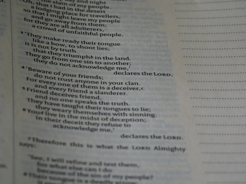 A close-up of a page with text, possibly from a religious or spiritual book, featuring numbered paragraphs and a structured layout. The text is clearly printed and fills the left side of the page, with margins and a dotted line on the right.