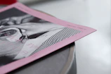 Close-up of a detailed printed flyer with vivid colors.
