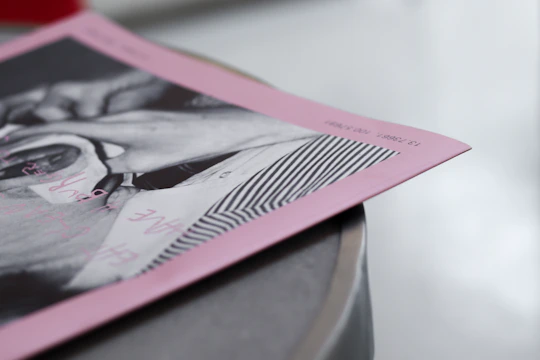 Close-up of a colorful flyer being printed with sharp details on premium paper.
