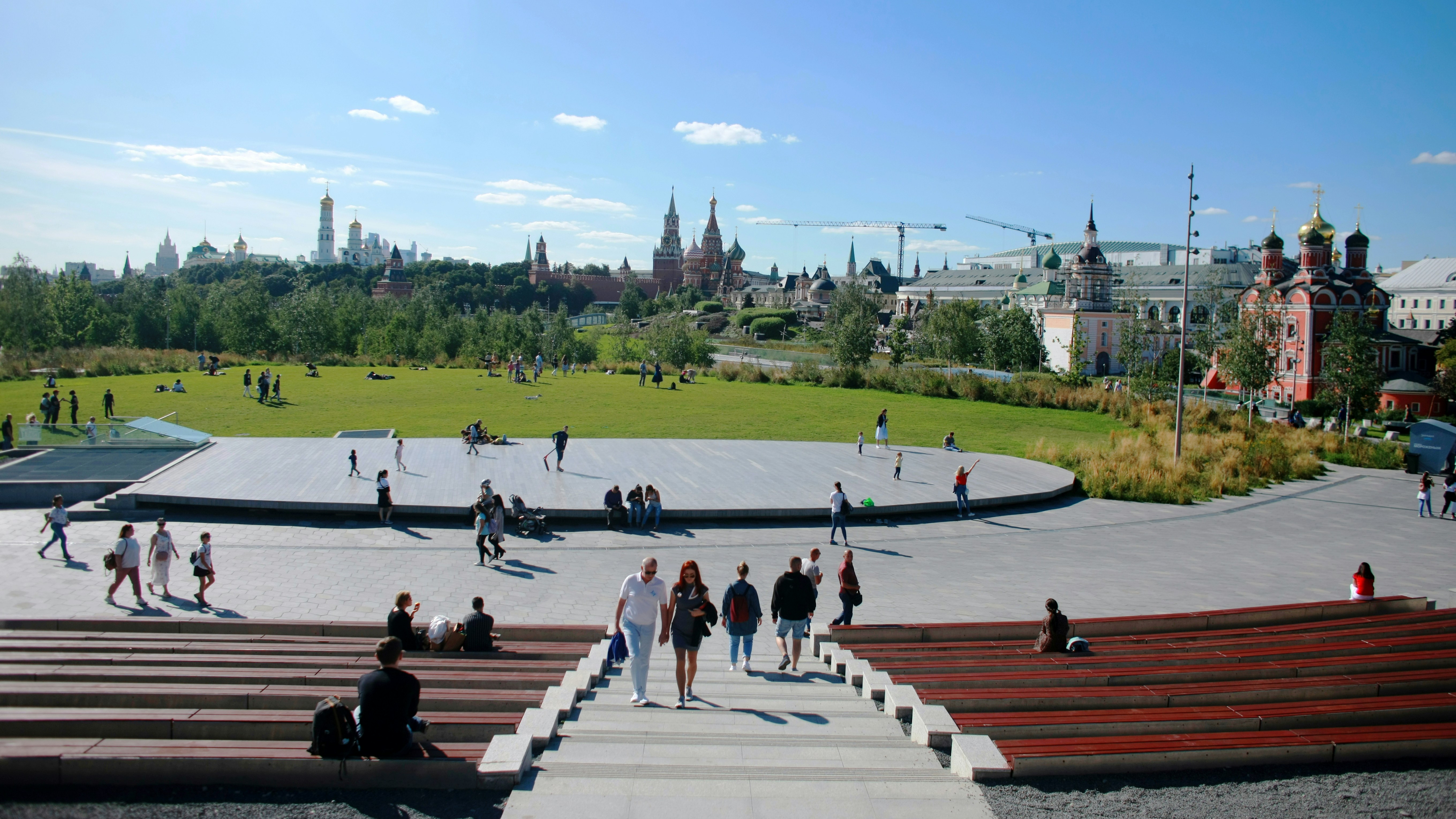 a group of people walking up and down some steps