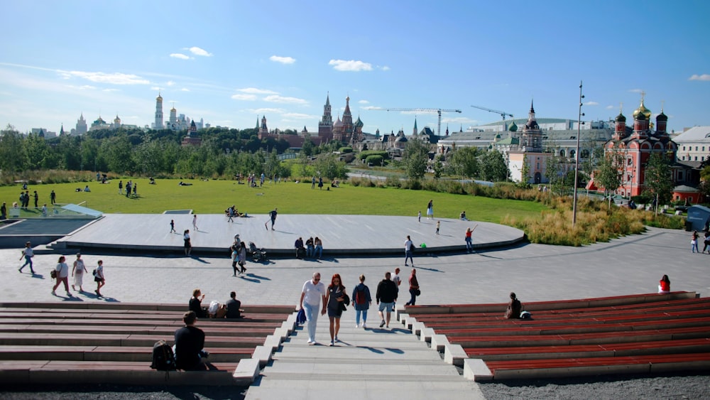 a group of people walking up and down some steps