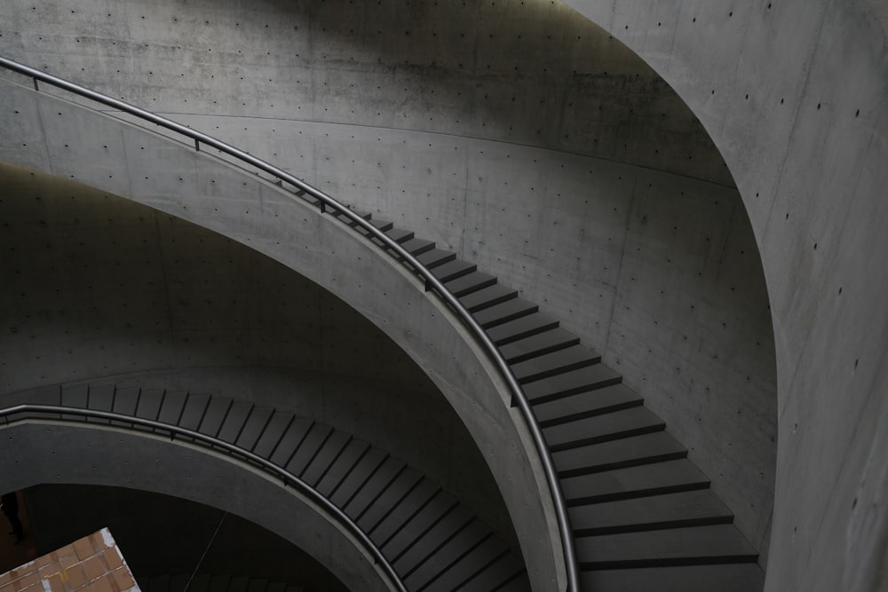 a man riding a skateboard down a set of stairs