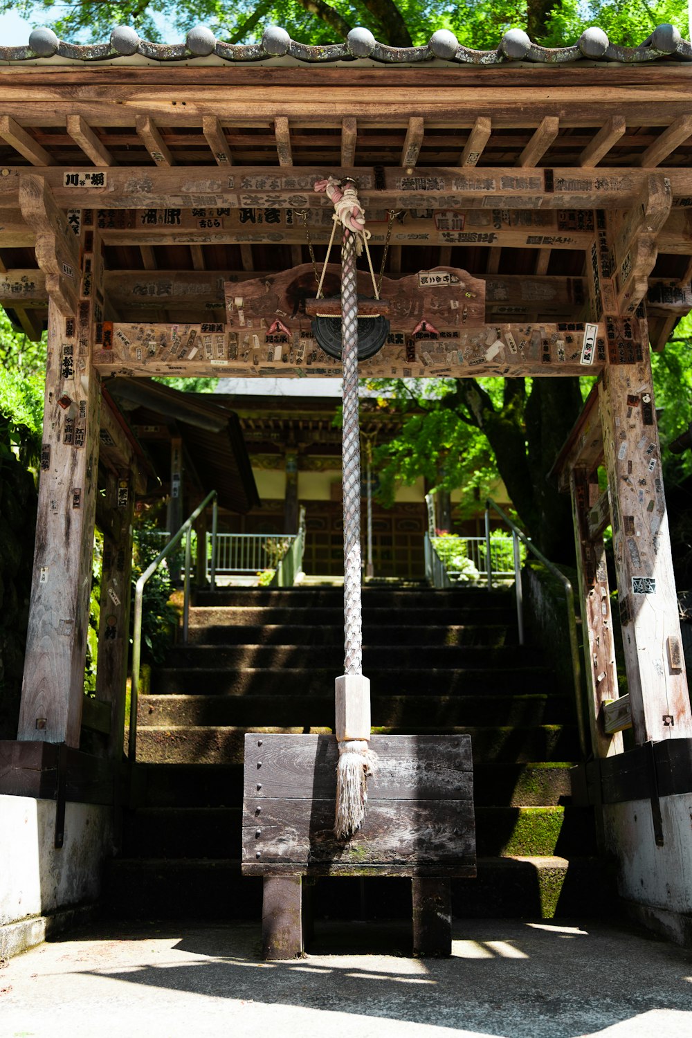 a wooden structure with a cross on top of it