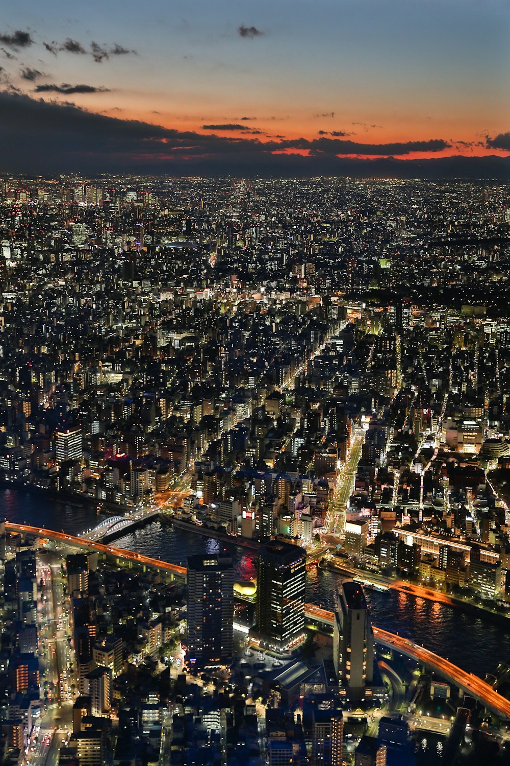 an aerial view of a city at night