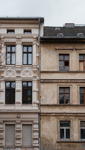 a tall building with a clock on the side of it