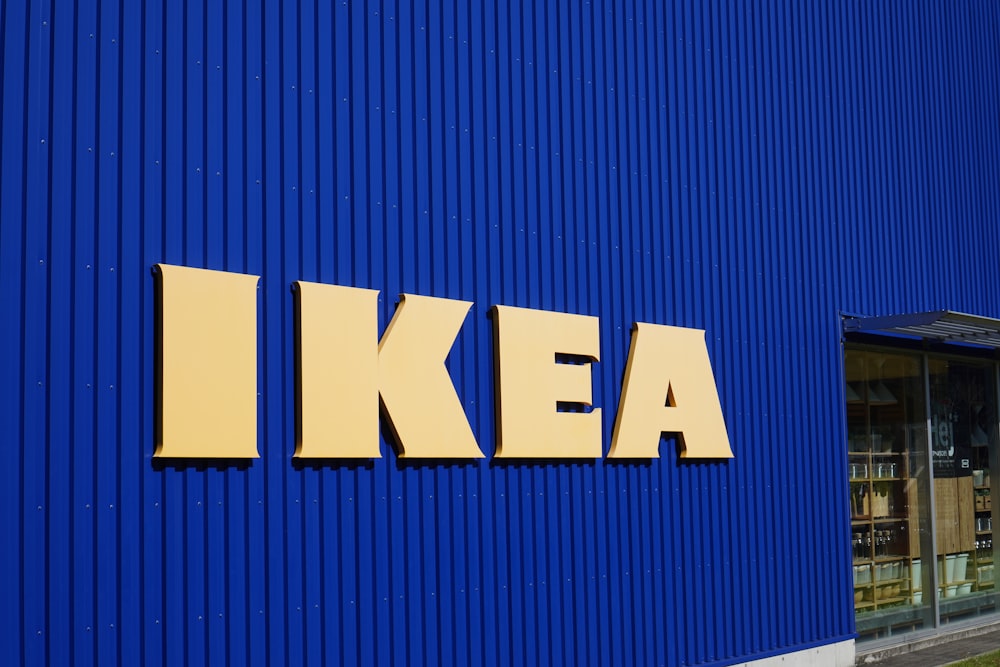 a blue building with the word ikea painted on it