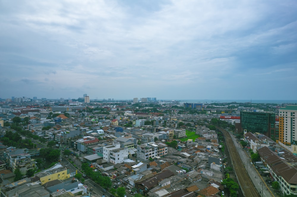 an aerial view of a city with a lot of buildings