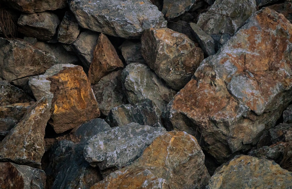 a pile of rocks that are brown and gray