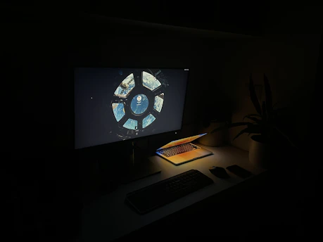 A futuristic workspace with holographic compliance checklists floating above a keyboard lit in space blue and bright orange.