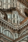 A close-up of the intricate architecture of a villa's facade.