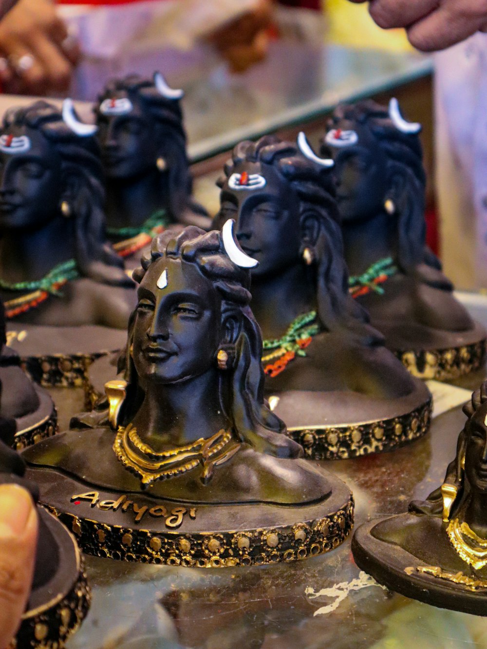 a close up of a group of statues on a table