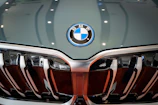 Close-up of a shiny BMW grille with the iconic logo.