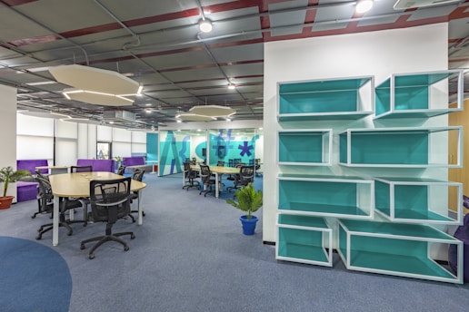 Modern office space with flexible seating and connected technology in use