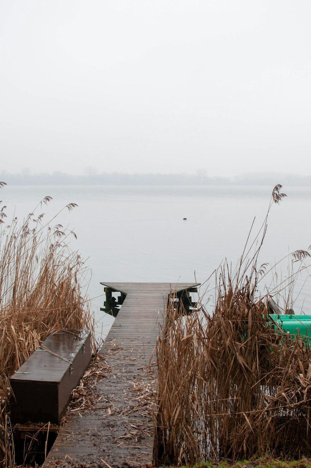 a dock that is next to a body of water