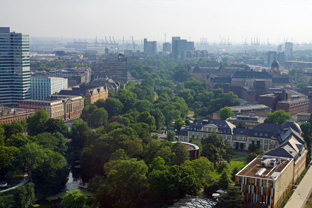 an aerial view of a city with tall buildings