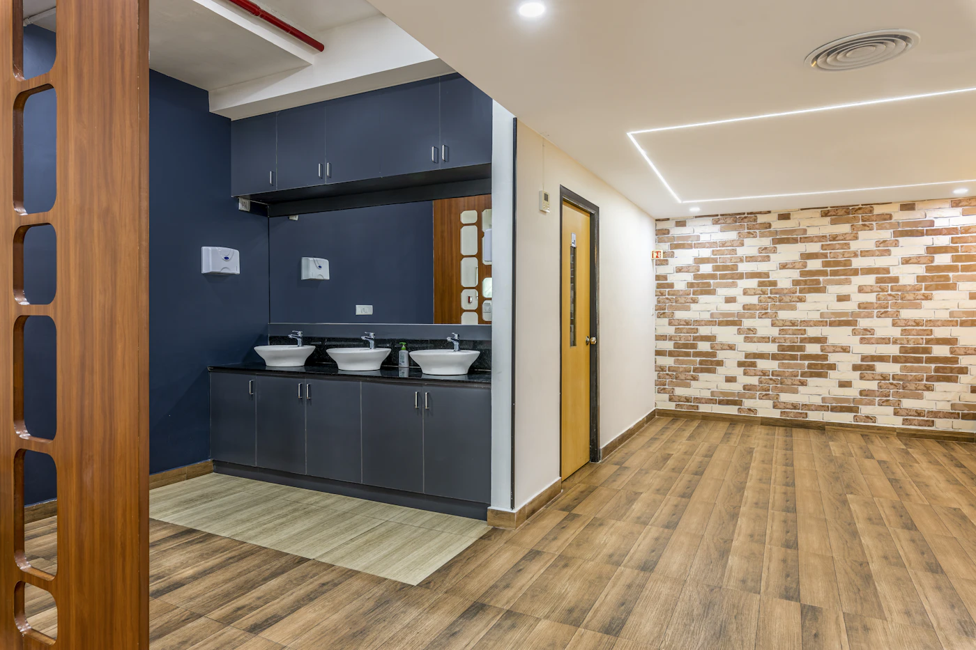 Bathroom with wood-look tile flooring