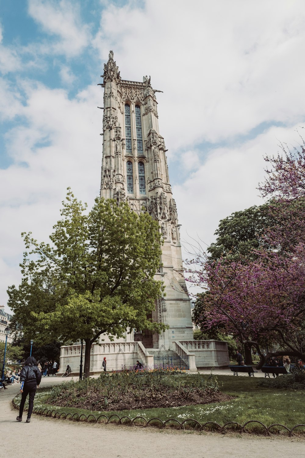 a tall tower with a clock on the top of it